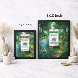 May include: Two framed prints, one 5x7 inches and the other 8x10 inches, featuring a serene forest scene with a stream. Each frame has a black border and includes a trading card slot label. The artwork depicts lush greenery and a tranquil water body.