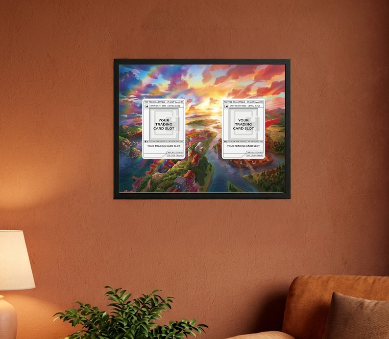May include: Framed artwork featuring a vibrant landscape with a river and colorful sky. Two white card slots with the text "YOUR TRADING CARD SLOT" are overlaid on the image. The artwork is displayed in a black frame.