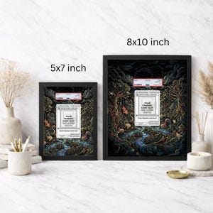 May include: Two framed art prints, one 5x7 inches and the other 8x10 inches, feature a detailed fantasy illustration with a trading card slot design. The artwork is set in a dark forest with a river, and includes the text "YOUR TRADING CARD SLOT".