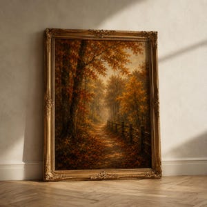 Può includere: Un'opera d'arte da parete rettangolare incorniciata che presenta un dipinto a olio di un sentiero nel bosco in autunno. La scena raffigura alberi con fogliame arancione e marrone, una staccionata in legno lungo un sentiero e una cornice dorata.
