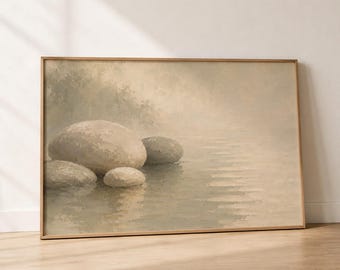 Könnte beinhalten: Gerahmtes Landschaftsgemälde mit einer ruhigen Wasserszene mit mehreren glatten, hellfarbigen Steinen. Das Kunstwerk hat eine gedämpfte Farbpalette aus Beige, Grau und Hellgrün und erzeugt eine beruhigende und natürliche Ästhetik.