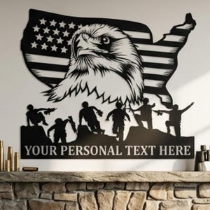 May include: A black metal wall art piece featuring an eagle's head, the American flag, and a silhouette of the United States. Below, a group of silhouetted figures are depicted. The text "YOUR PERSONAL TEXT HERE" is included.