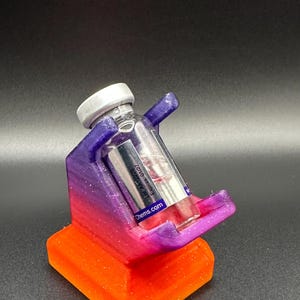 Herramienta etiquetadora de viales de 10 ml para una aplicación precisa del etiquetado.