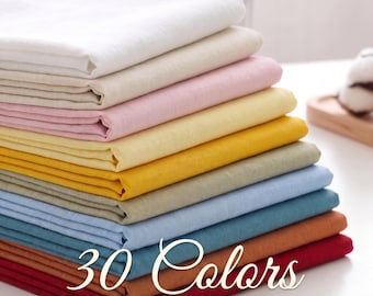 May include: A stack of folded fabric squares in various colors including white, beige, light pink, yellow, sage green, light blue, teal, orange, and red. The text 30 Colors 100% Linen 188gsm is overlaid on the bottom of the fabric stack.