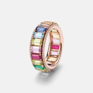 May include: A set of three ceramic nesting bowls in shades of blue, green, and white. The bowls feature a speckled glaze and a simple, modern design. The largest bowl measures approximately 6 inches in diameter.