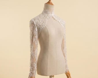 Custom bolero sleeves. Detachable bolero sleeve accessories. Detachable sleeves embellished with sparkling beads.