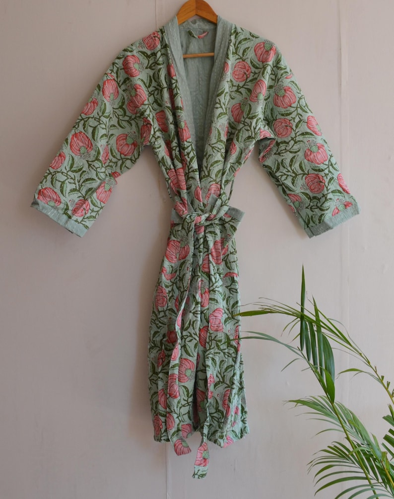 Green Floral Kantha Robe tied with belt, showing fitted waist for bohemian style.