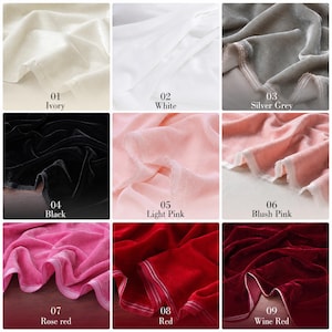 Puede incluir: Una cuadr&iacute;cula de nueve muestras de tela de material tipo terciopelo en varios colores etiquetadas 01 Ivory, 02 White, 03 Silver Grey, 04 Black, 05 Light Pink, 06 Blush Pink, 07 Rose red, 08 Red y 09 Wine Red, mostrando pliegues drapeados.