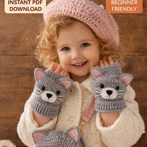 May include: A crochet pattern for cat mittens and a purse. The image shows a child wearing gray cat-shaped mittens and carrying a matching purse. The mittens and purse have pink accents and white whiskers. The text on the image says "Instant PDF Download" and "Beginner Friendly".