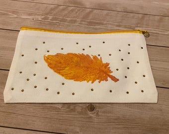 Feather and rhinestone pouch