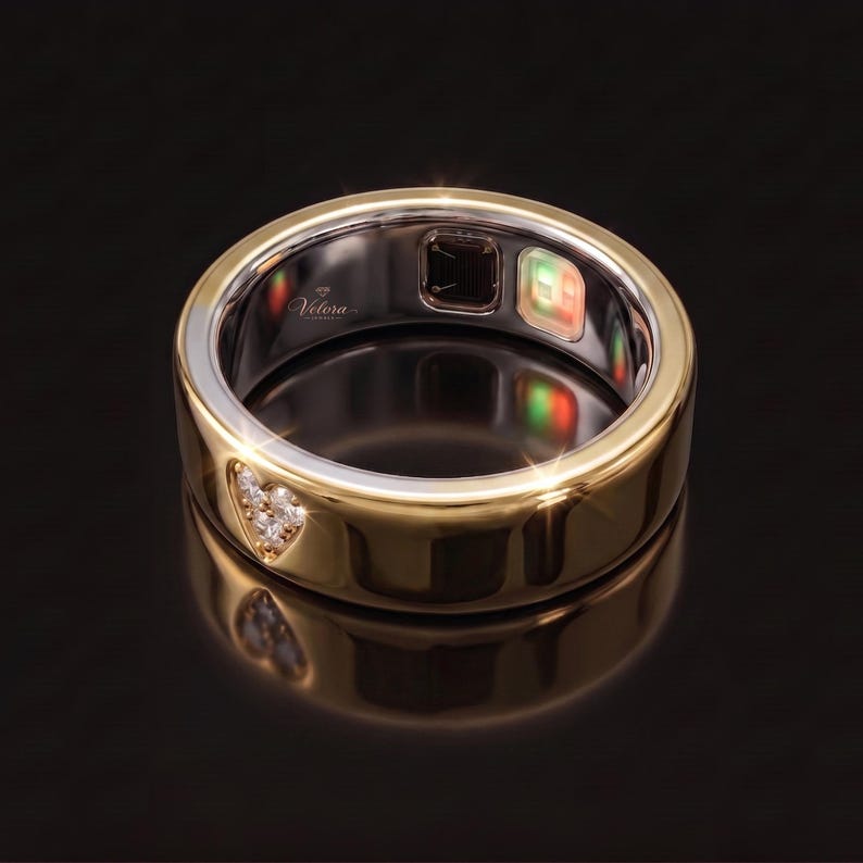 Beautiful Oura Ring Gen 5 jewelry cover in solid 14K gold with a matte finish and decorative diamond-cut design. This premium smart ring accessory creates a luxurious layered look, making your wearable ring appear like a custom fine jewelry band.