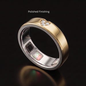 Luxury smart ring accessory crafted in solid 14K gold with a sophisticated matte gold finish and decorative diamond-cut texture. Compatible with Oura Ring Gen 5, this stylish protector sleeve transforms a modern smart ring into an elegant statement piece suitable for daily wear.