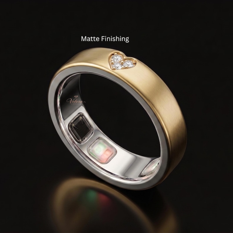 Solid 14K Gold Oura Ring Gen 5 Cover featuring a luxurious matte finish and precision diamond-cut detailing. This elegant smart ring protector sleeve is designed to enhance the appearance of your wearable device while adding the timeless beauty of fine jewelry to your everyday style.