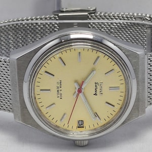 Vintage HMT Tareeq Date Wrist Watch, Yellow Dial, India Made
