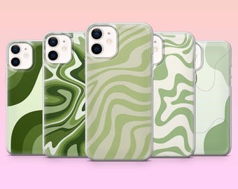 May include: Five phone cases with various green abstract designs. The cases have a clear border and a light pink background. The designs include wavy patterns, swirls, and organic shapes in shades of green.