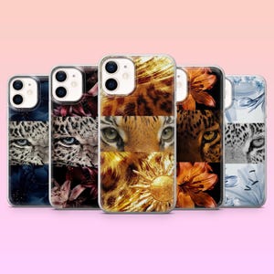 May include: A collection of phone cases featuring animal eye designs. The cases display close-up images of leopard, tiger, and other animal eyes, with floral and abstract backgrounds. The cases are in various colors, including blue, brown, and gold.