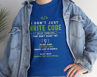 May include: A royal blue t-shirt featuring green and white text that reads: I DON'T JUST WRITE CODE, I SOLVE PROBLEMS THAT DON'T EXIST YET, SILENT MIND, FOCUSED SOUL, ENDLESS LOOP OF GROWTH, BUILT WITH PASSION, NOT JUST SYNTAX.