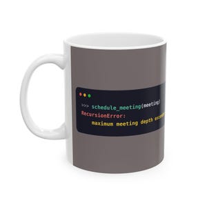May include: A white ceramic mug featuring a dark gray rectangular graphic that mimics a computer terminal window. The text reads: >>> schedule_meeting(meeting) RecursionError: maximum meeting depth exceeded, with colored status dots.