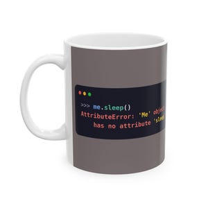 May include: A white ceramic mug featuring a dark grey rectangular graphic with rounded corners. The graphic displays the code snippet '>>> me.sleep()' followed by the error message 'AttributeError: 'Me' object has no attribute 'sleep'.'