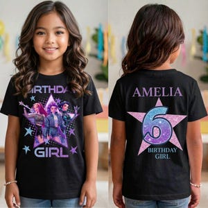 May include: Black t-shirt with a star design featuring three cartoon characters and the text "BIRTHDAY GIRL". The back of the shirt has the name "AMELIA" above a glittery number 6 and the words "BIRTHDAY GIRL".