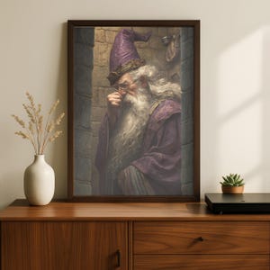 May include: A framed print of a wizard in a purple robe and hat, with a long white beard and glasses. The wizard is in a stone archway, with a thoughtful expression. The frame is dark brown.
