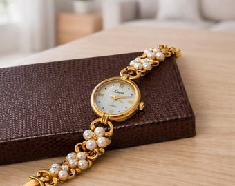 Lucoral Gold Watch With Triple Strand Faux Pearl Band and  display picture 2