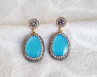 925 ayar gümüş kedigözü taşlı küpe