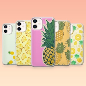 May include: Five phone cases with pineapple designs. The cases display patterns of pineapple slices, whole pineapples, and pineapple motifs on light green, yellow, and pink backgrounds. The cases are made of clear plastic.