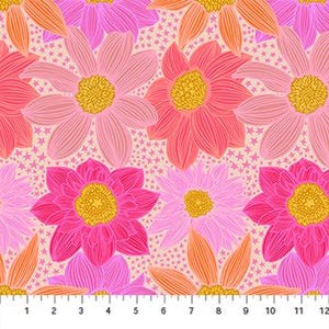 May include: A fabric with a repeating floral pattern. Large flowers in shades of pink and orange with yellow centers are set against a light beige background dotted with tiny stars. A ruler is at the bottom, marked in inches.