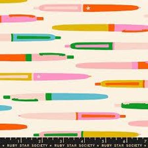 May include: A pattern of colorful pens in various shades of pink, orange, yellow, green, and blue on a cream background. The pens have a simple, modern design, with some featuring star accents. The text "RUBY STAR SOCIETY" is at the bottom.