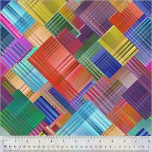 May include: A vibrant fabric with a geometric pattern of overlapping squares and diagonal lines in shades of red, orange, yellow, green, blue, and purple. A ruler with inch measurements is at the bottom.