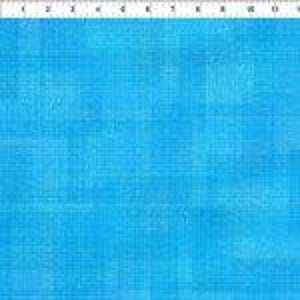 May include: A bright cyan fabric with a subtle crosshatch texture, featuring a printed grid pattern. A white ruler with black markings is visible along the top edge, showing measurements in inches from zero to thirteen inches across the fabric.