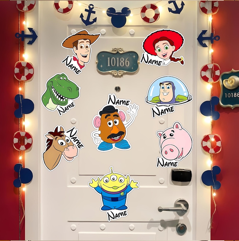 May include: A white door decorated with various Toy Story character stickers, including Woody, Jessie, Rex, Buzz Lightyear, Mr. Potato Head, and others. The door also features nautical-themed decorations like anchors and life preservers, along with a string of lights.