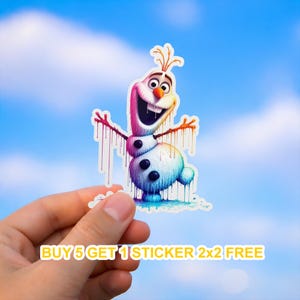 May include: A colorful sticker featuring Olaf from Frozen, with a melting effect. The sticker has a white outline and is held against a blue sky background. The text "BUY 5 GET 1 STICKER 2x2 FREE" is at the bottom.