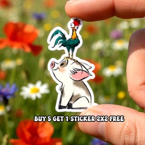 May include: A sticker featuring a cartoon pig with a rooster on its back. The pig is white with pink ears and a smiling expression. The rooster has red, green, and yellow coloring. The text "BUY 5 GET 1 STICKER 2X2 FREE" is at the bottom.