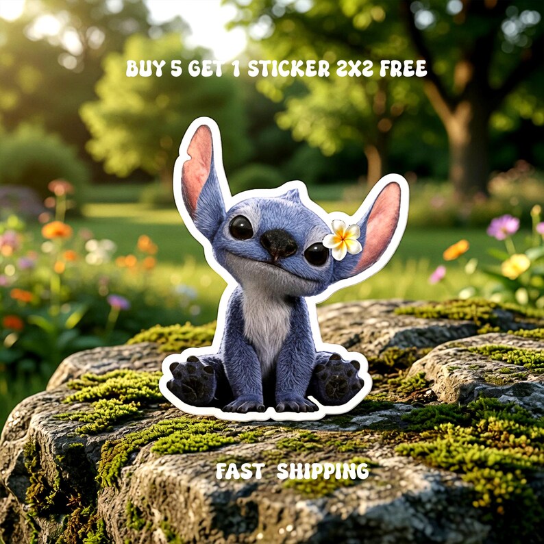 May include: A blue cartoon character sticker with large ears and a flower behind one ear. The sticker is on a mossy rock with the text "BUY 5 GET 1 STICKER 2X2 FREE" and "FAST SHIPPING".