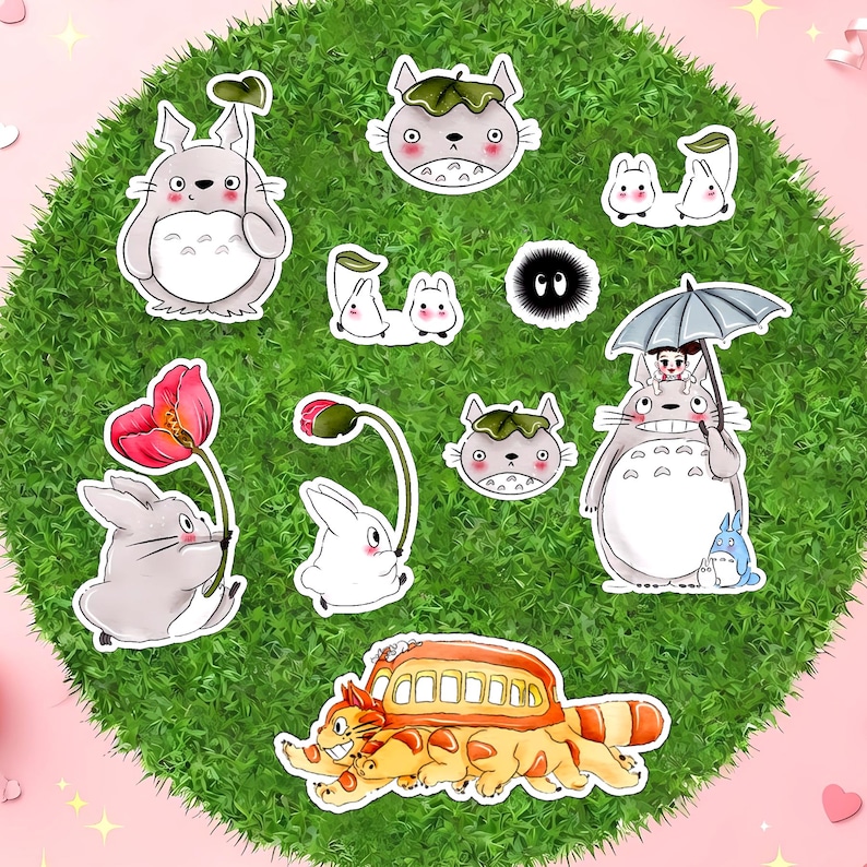 May include: A collection of vinyl stickers featuring various animated characters, including a large grey creature holding a leaf, a cat-shaped bus, small white spirits, a black soot sprite, and a grey creature holding a large umbrella with a small figure.