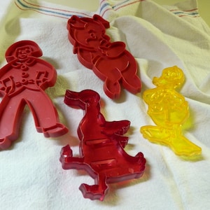 Cortadores de galletas Tupperware vintage: Hombre de jengibre, Cerdito, Pato Donald, Pato bailarín - Juego de 4