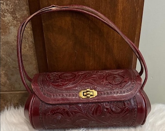 Vintage unique deep red burgundy tooled barrel bag purse twist lock boho western