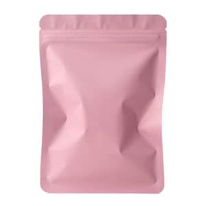 May include: A pink, rectangular, resealable pouch with a zip closure at the top. The pouch has a matte finish and is empty. The sides of the pouch are creased, giving it a three-dimensional appearance. The overall shape is a simple, clean design.