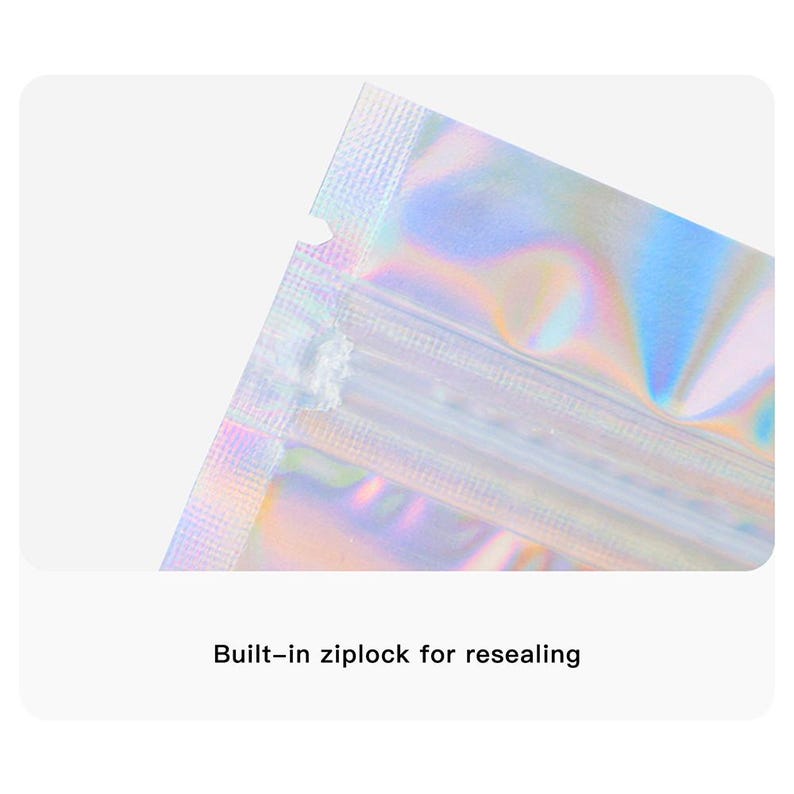 May include: Close-up of a holographic, iridescent zip-lock bag. The bag's surface reflects a spectrum of colors, including blues, greens, and purples. The text "Built-in ziplock for resealing" is visible at the bottom.