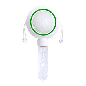 May include: A white bubble wand featuring a circular top with a green ring surrounding a textured white golf ball. The handle is a clear, cylindrical container with a wand inside that has three circular loops for creating bubbles, plus two white cords.