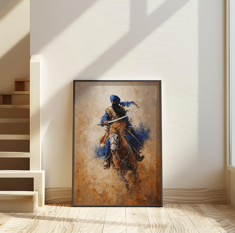 May include: Framed art print of a Sikh warrior on horseback, painted in a loose, expressive style. The artwork shows a figure in blue and gold, holding a sword, against a background of browns and tans. The image is framed in a black border.