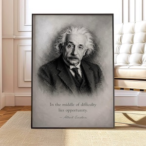 May include: A framed black and white portrait of Albert Einstein with messy hair, wearing a suit and tie. Below the portrait, the text reads: In the middle of difficulty lies opportunity. — Albert Einstein. The artwork has a charcoal sketch style.