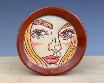 Face trinket dish