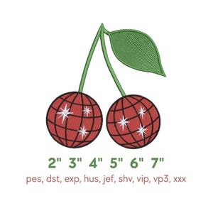 May include: An embroidery design featuring two red disco ball cherries with black grid lines and white star accents, connected by green stems and a single green leaf. Text below reads 2" 3" 4" 5" 6" 7" and pes, dst, exp, hus, jef, shv, vip, vp3, xxx.