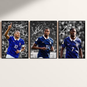 May include: Three framed posters featuring French national football players in blue jerseys with white accents. Each player is shown in a stadium setting with a white autograph overlay. The jerseys display numbers 10, 11, and 7 respectively.