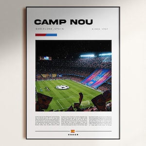 May include: A framed poster featuring the Camp Nou stadium in Barcelona, Spain, with the text "CAMP NOU" at the top. The image shows a soccer field with a large crowd and flags. The poster includes the text "BARCELONA, SPAIN" and "SINCE 1957".