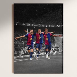 May include: Black and white framed print featuring three soccer players in blue and maroon jerseys celebrating a victory on a field. The print includes player signatures and the word "Supercopa".