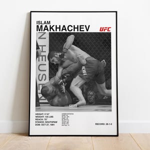 May include: Black and white framed poster featuring Islam Makhachev in a UFC fight. The poster includes the UFC logo, fighter's name, and fight statistics such as height, weight, reach, stance, and record.